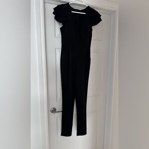 PRONTO Moda Italia Black V-Neck Flutter Sleeve Jumpsuit - Women's Size:0-2
New!